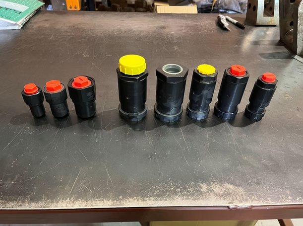 OilQuick hydraulic parts and attachments